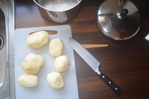 peeled raw potatoes