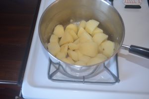 potatoes drained and ready to mash