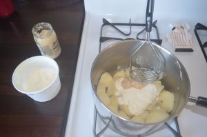 adding sour cream and horseradish